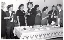 A group of adults at an America Legion celebration